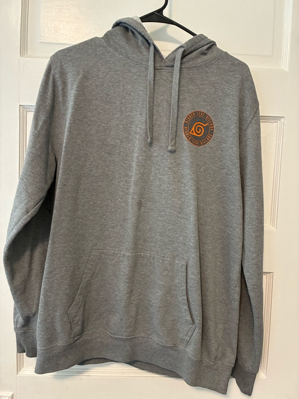Gray Pullover Hoodie with Small Orange Chest Emblem